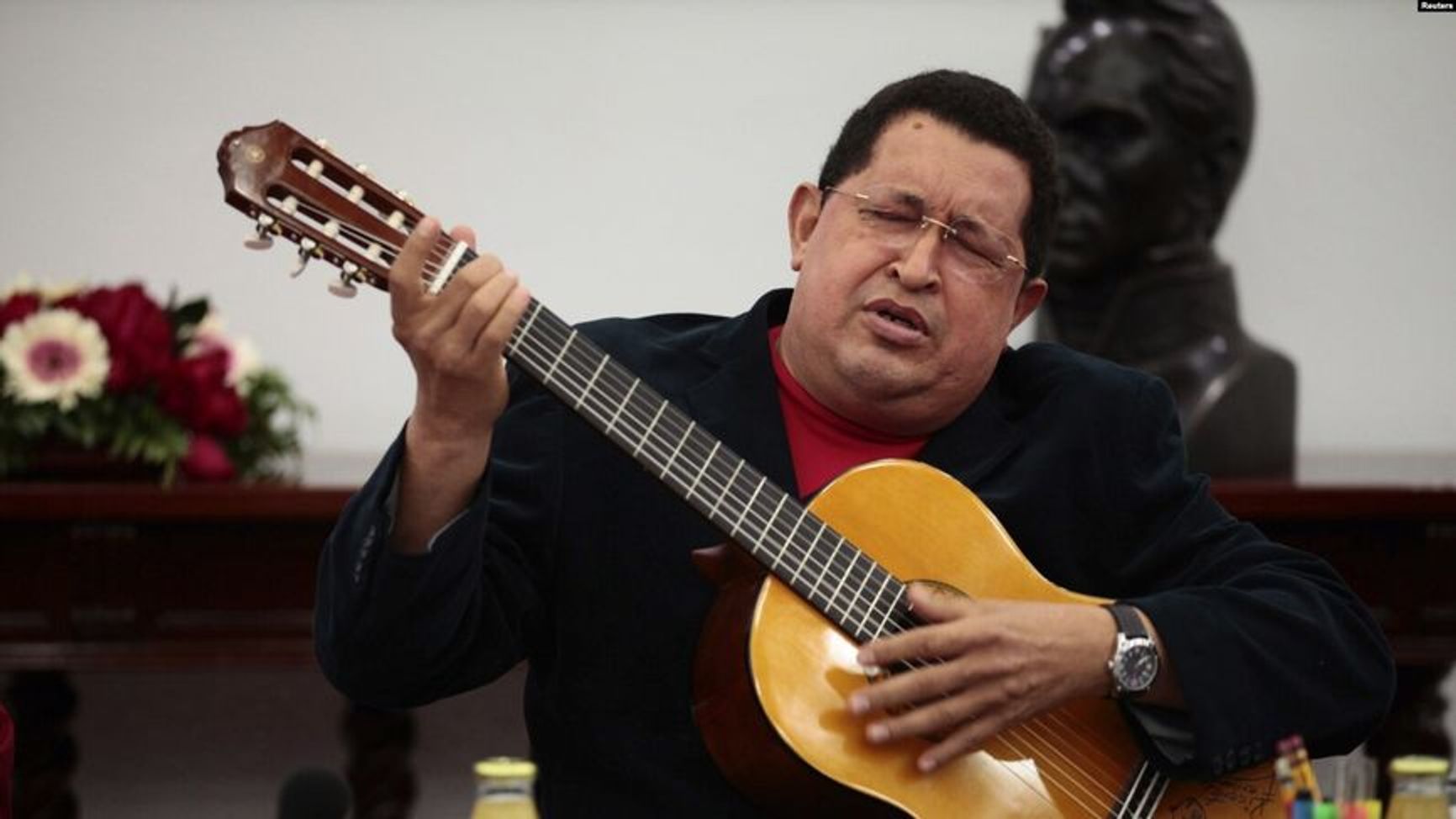 Hugo Chávez playing guitar