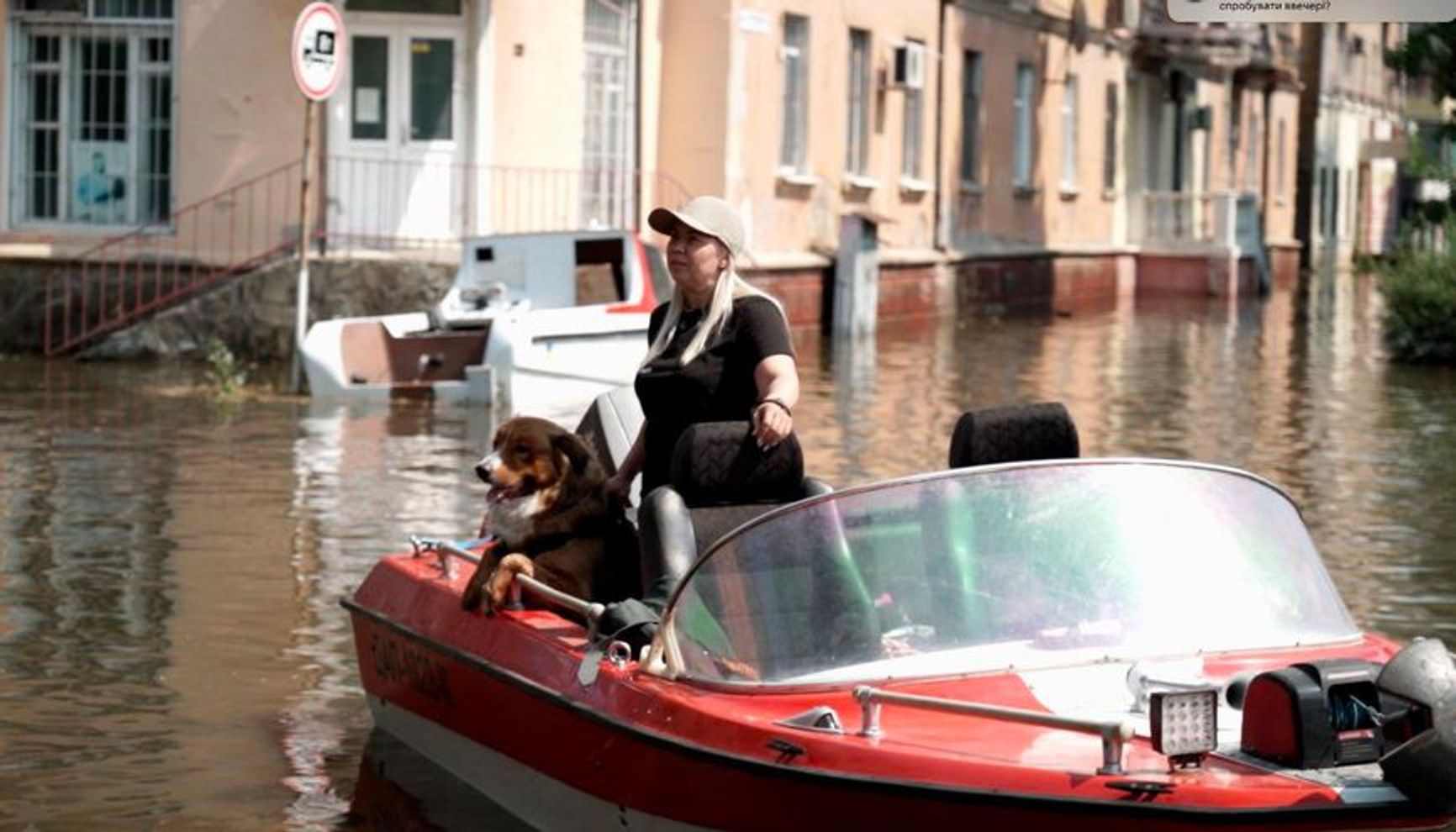 Olena on a boat during the flood in Kherson